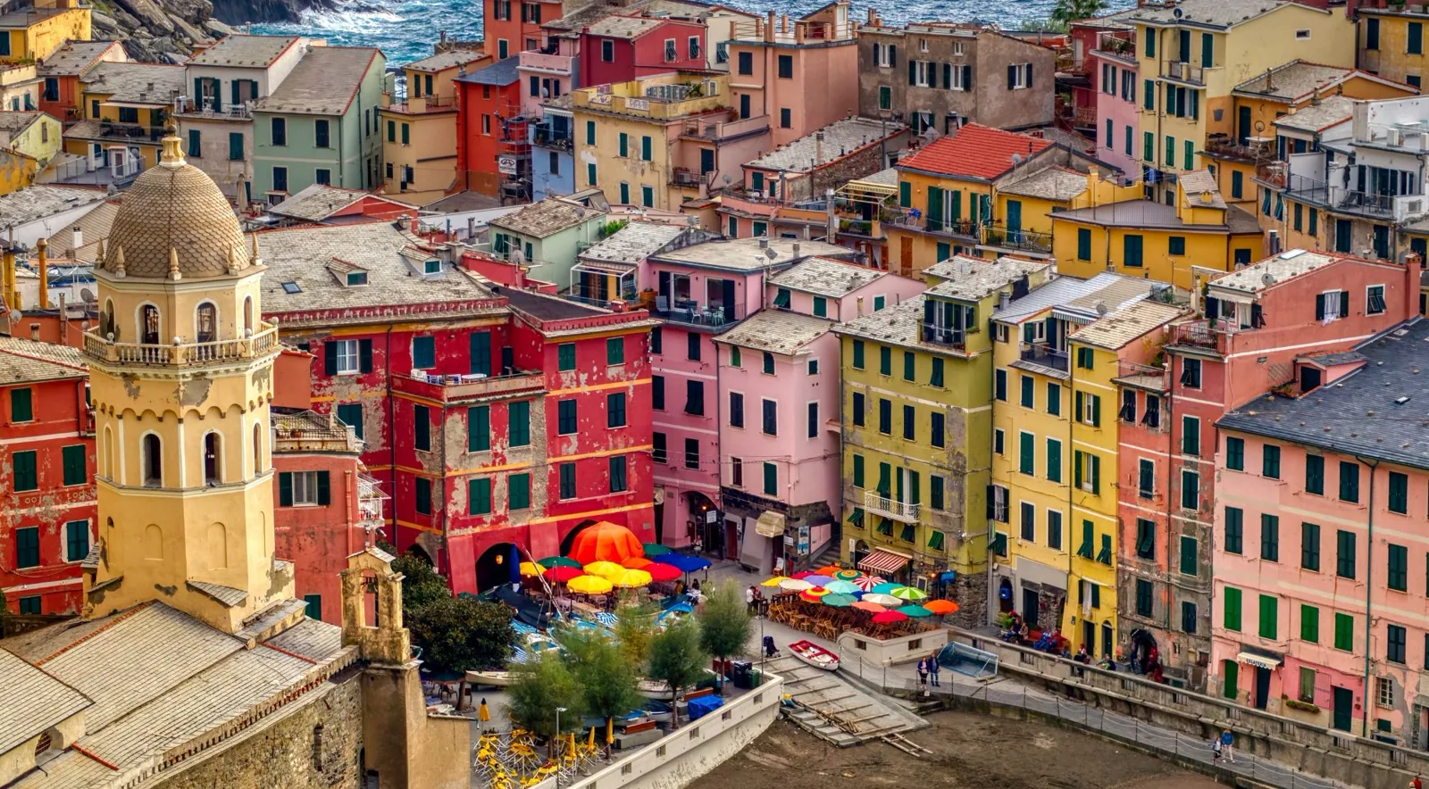 Vernazza's tower houses and piazza — colourful façades and the church square at the heart of the village